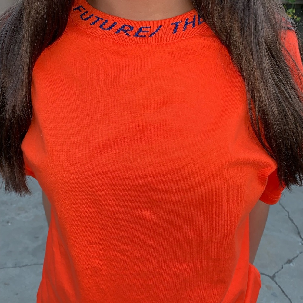 Orange T-shirt. Size small